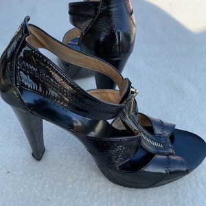 MICHAEL Michael Kors
Berkley Patent T-Strap Sandal